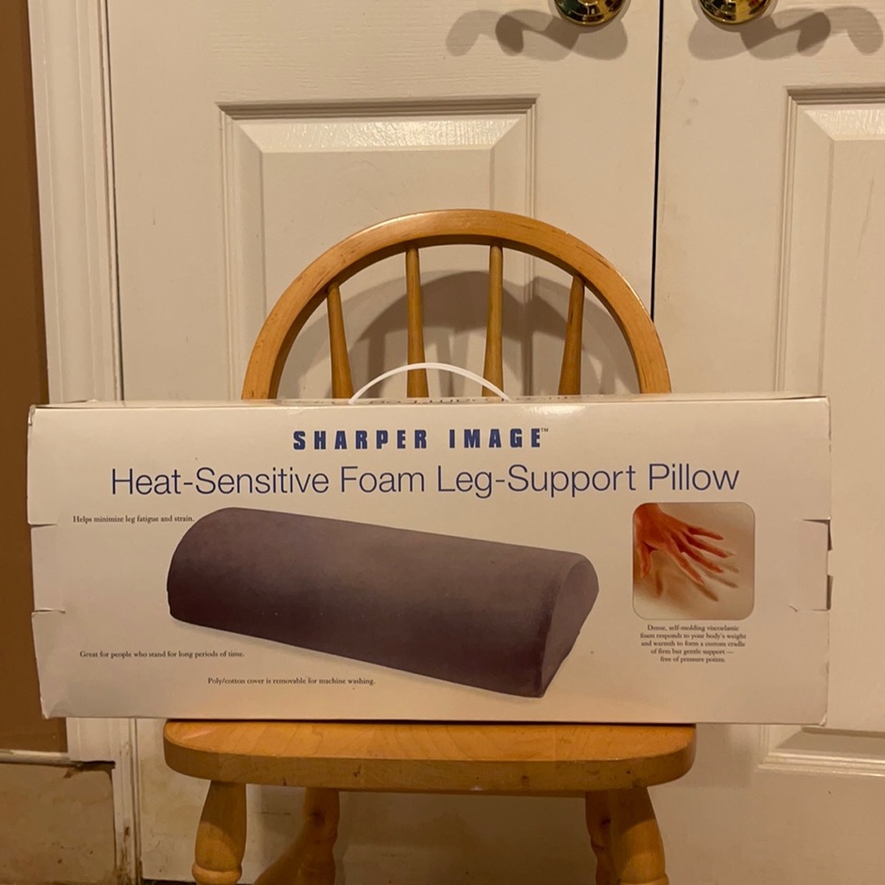 Sharper image heat sensitive foam leg support pillow